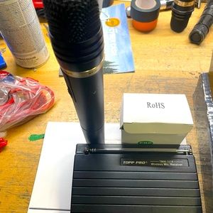 Wireless microphone set by Topp pro gear .
Vocal microphone